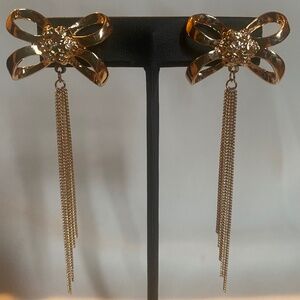 Long bow earrings with dangle chains